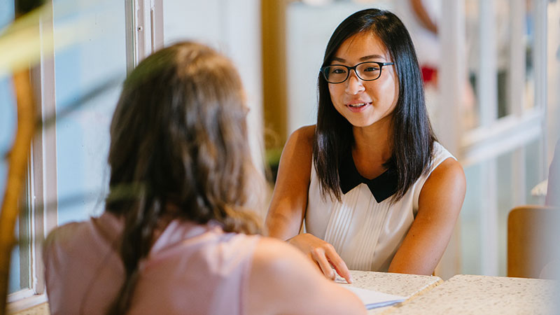 Two women discussing career opportunities in Counseling