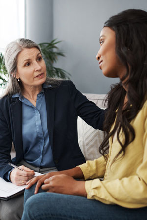 Counselor talking with client